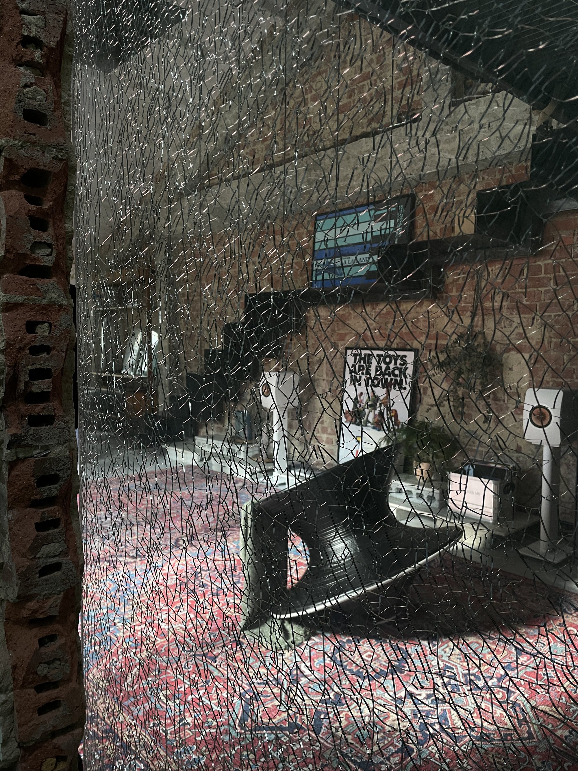 The studio at 2b Craig Road, seen through the crackle wire-glass
