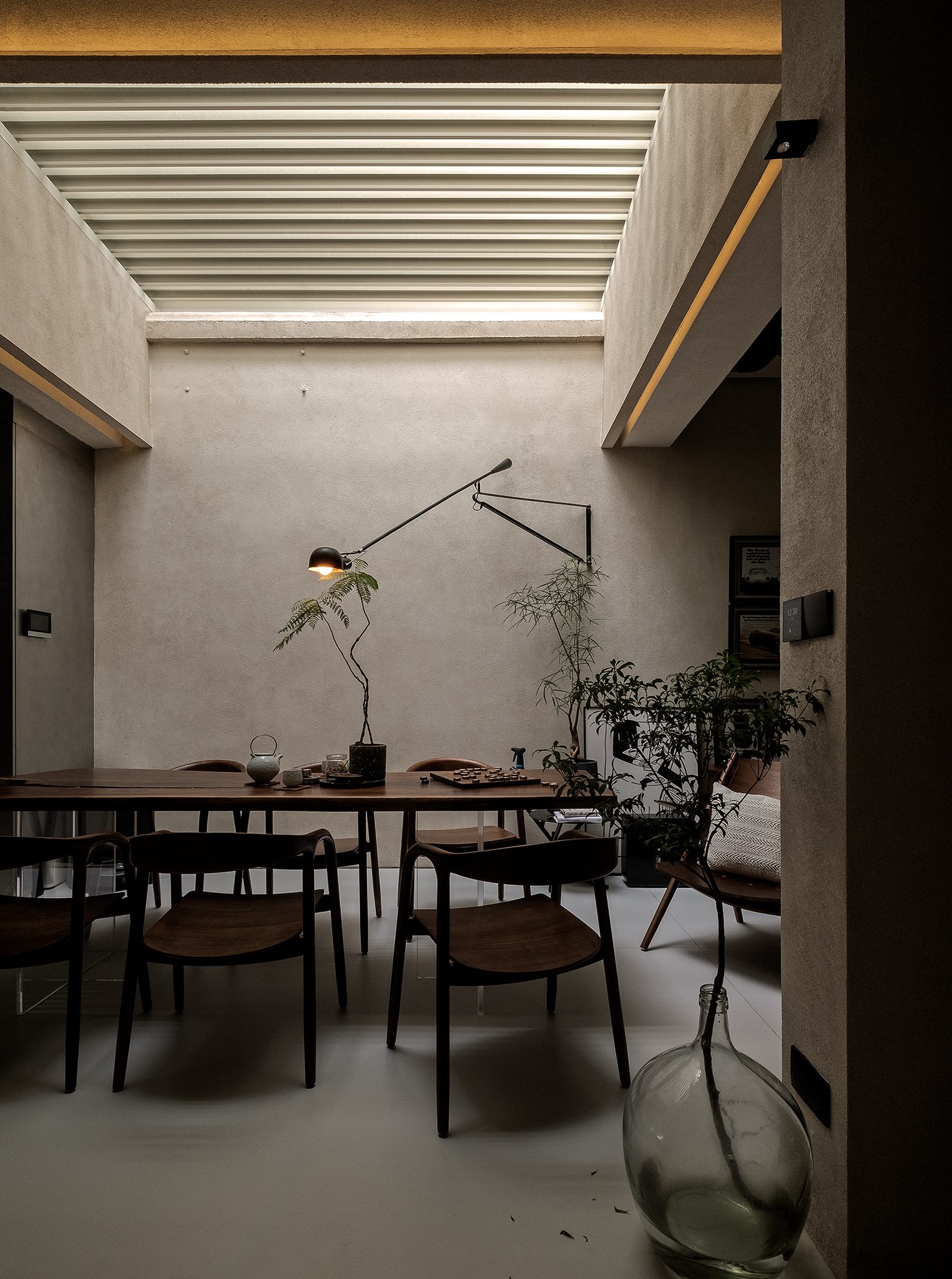 A finished UNO interior — a dining room in evening light